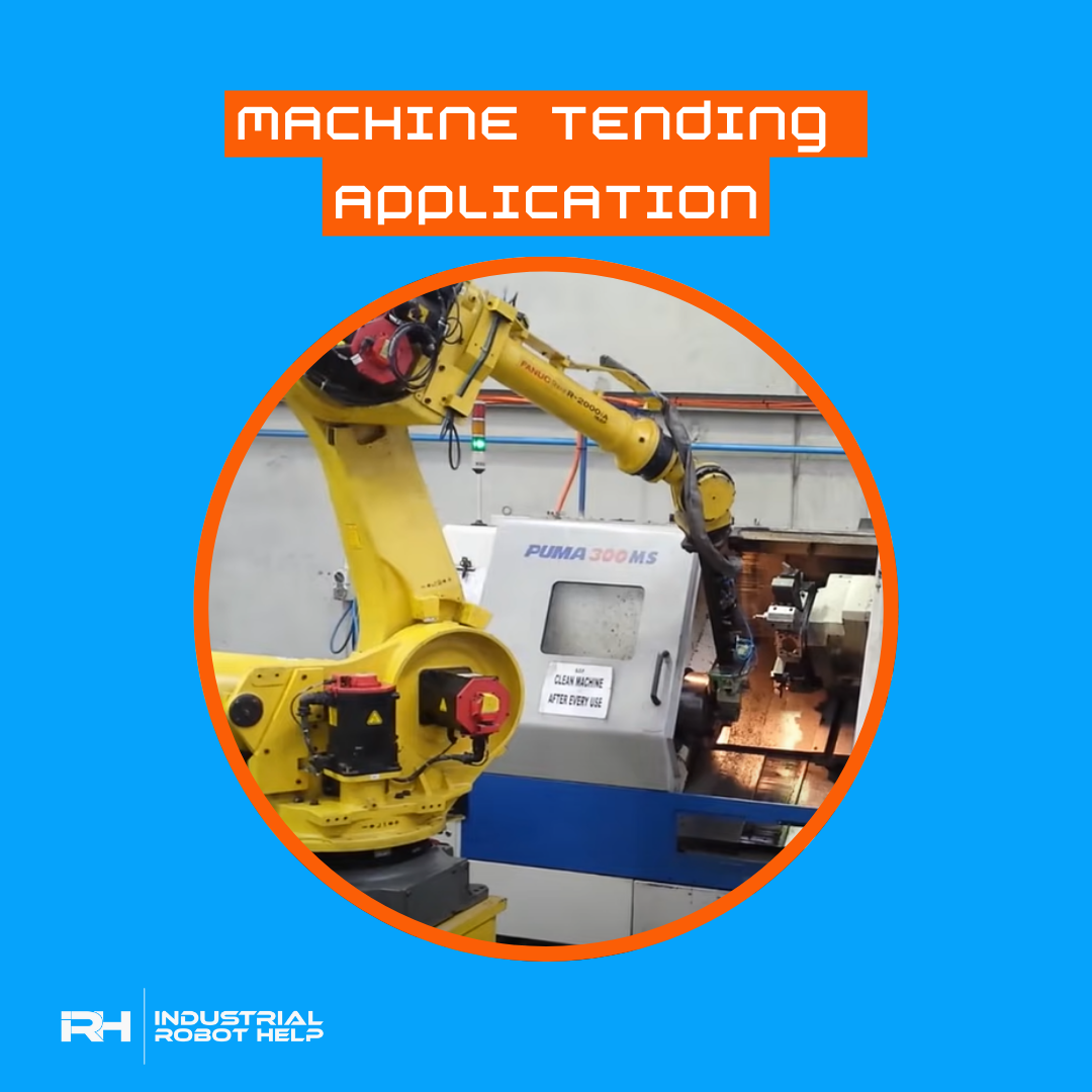 Industrial robot arm performing machine tending application, loading or unloading a machine.