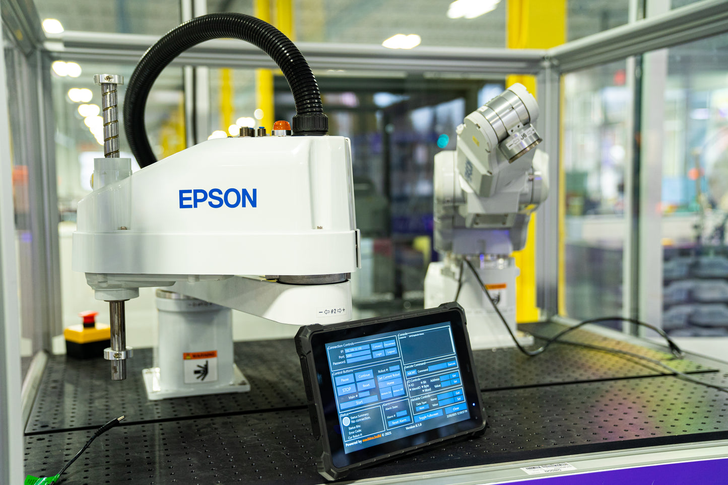 Ruggedized HMI tablet featuring touchscreen interface for Epson robot control and monitoring.