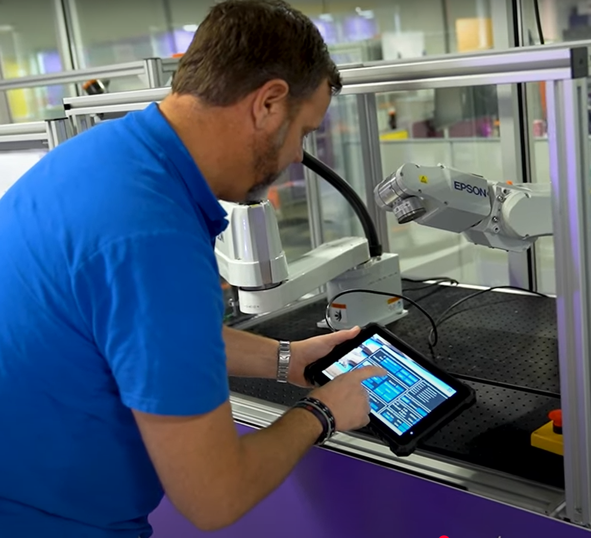 Willem Oswald operating a robotic arm with IRH Advanced HMI system